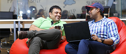 Members enjoying coworking space in South Delhi - The Office Pass